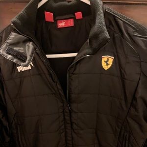 Gently used black Puma Ferrari Jacket size XS.